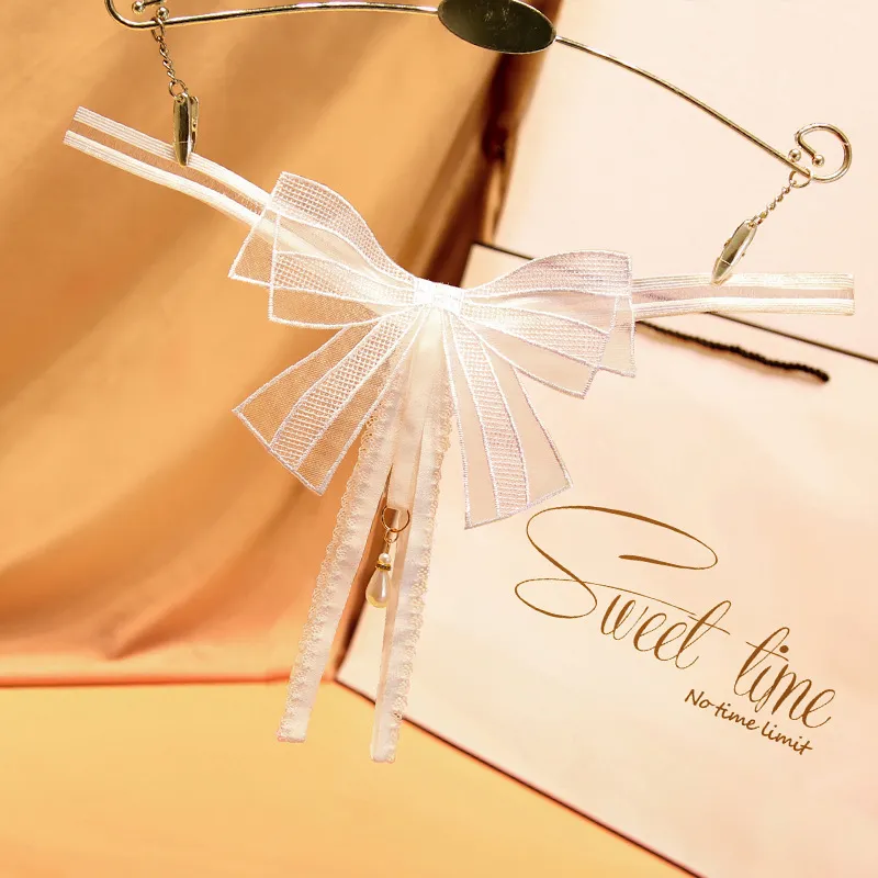 色気漂うする 全7色 リボンのデザイン 穴開き セクシー 刺繡 ビーズ付き Ｔバック・タンガ